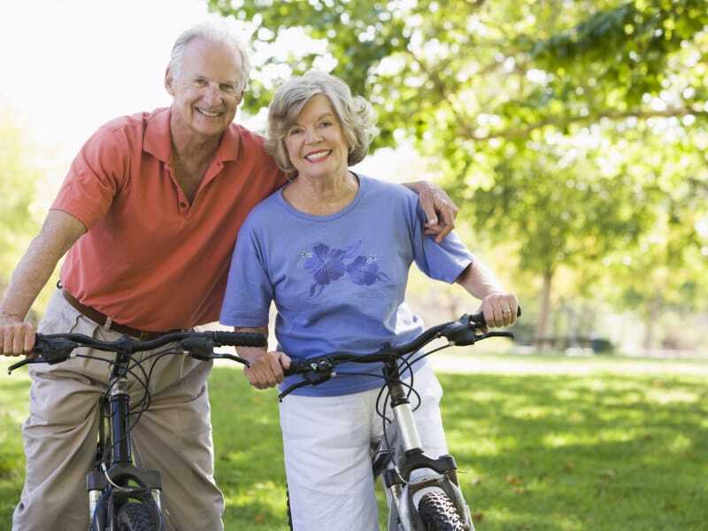 senior couple on bikes